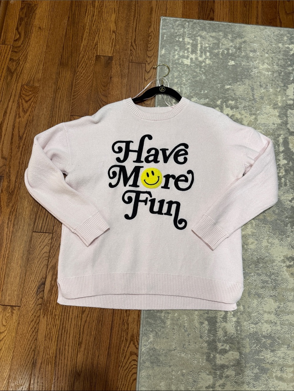 moon & madison Pink Crewneck Sweater with Black Script and Yellow Smiley